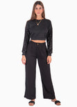 Buzo corto con mangas de lentejuelas color negro para mujer - Flashy