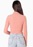 Buzo corto manga larga con cuello alto color rosado para mujer - Flashy