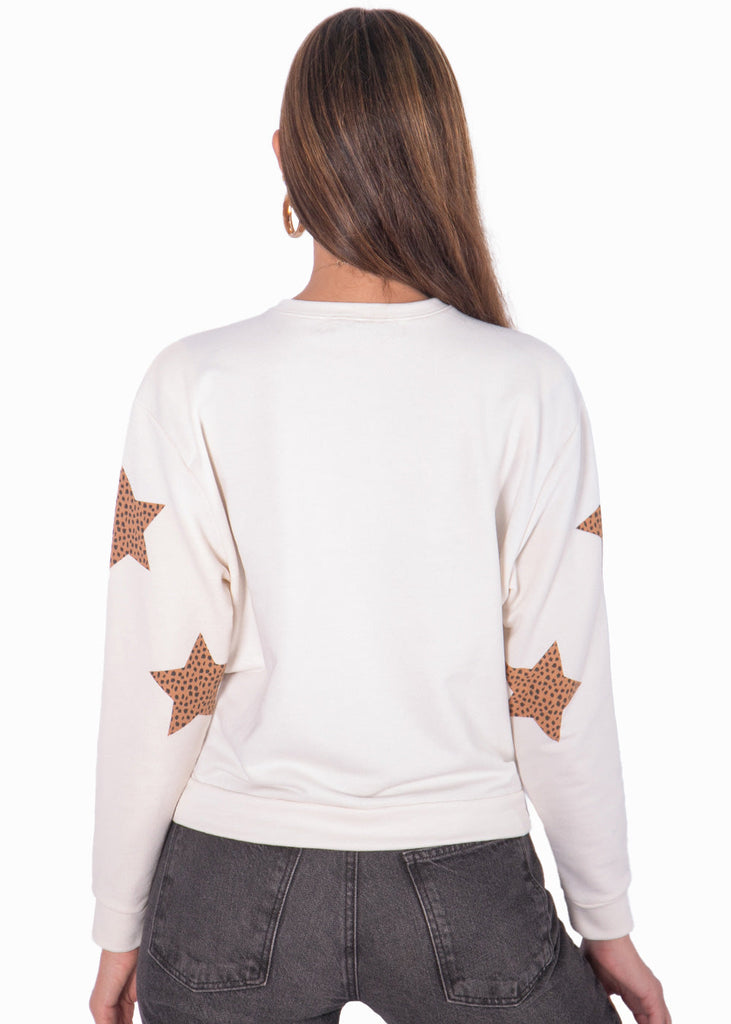 Buzo gráfico con estrellas en estampado de animal print color camel, blanco, marfil para mujer - Flashy