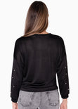 Buzo manga larga con perlas en mangas color negro para mujer - Flashy
