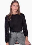 Buzo manga larga con perlas en mangas color negro para mujer - Flashy