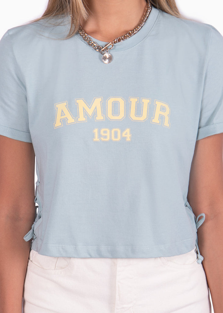 Camiseta corta con ojaletes en costados color azul para mujer - Flashy