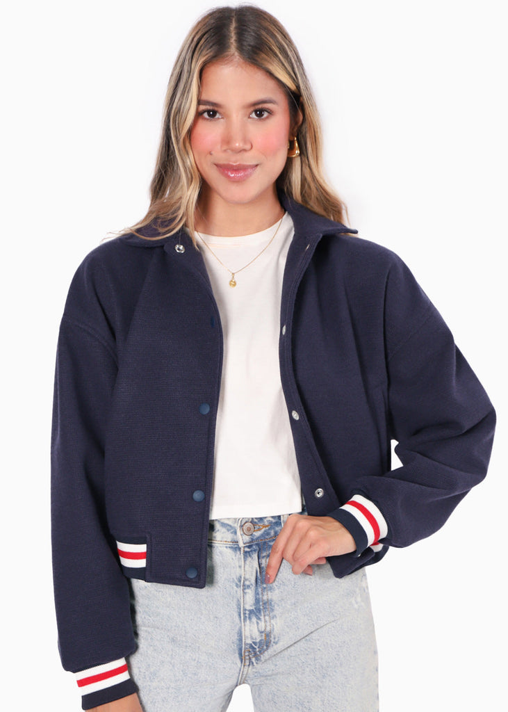 Chaqueta tipo college con puños y ruedo en contraste color azul para mujer - Flashy