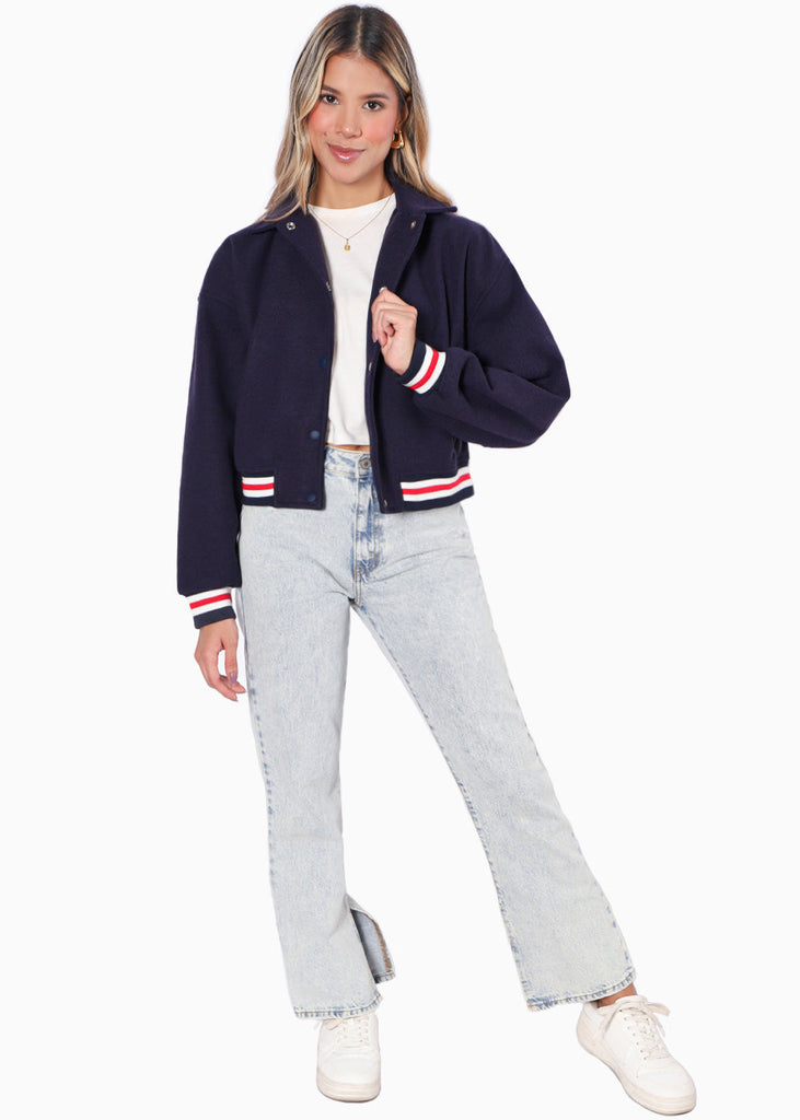 Chaqueta tipo college con puños y ruedo en contraste color azul para mujer - Flashy