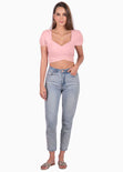 Crop top con escote cruzado y mangas embombadas color rosado para mujer - Flashy