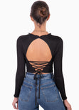 Crop top manga larga con cuello alto y anudados en espalda color negro para mujer - Flashy