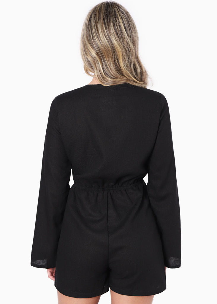 Enterizo de short con anudado en escote y manga larga color negro para mujer - Flashy