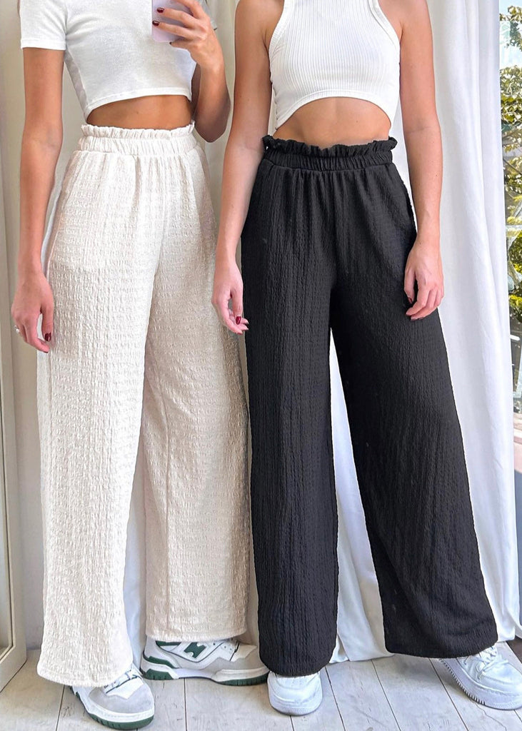 Pantalón recto tiro alto con elástico en cintura color negro para mujer - Flashy